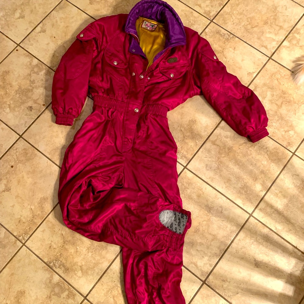 Phenix satin magenta and purple once piece snow suit with shoulder pads. Size 10